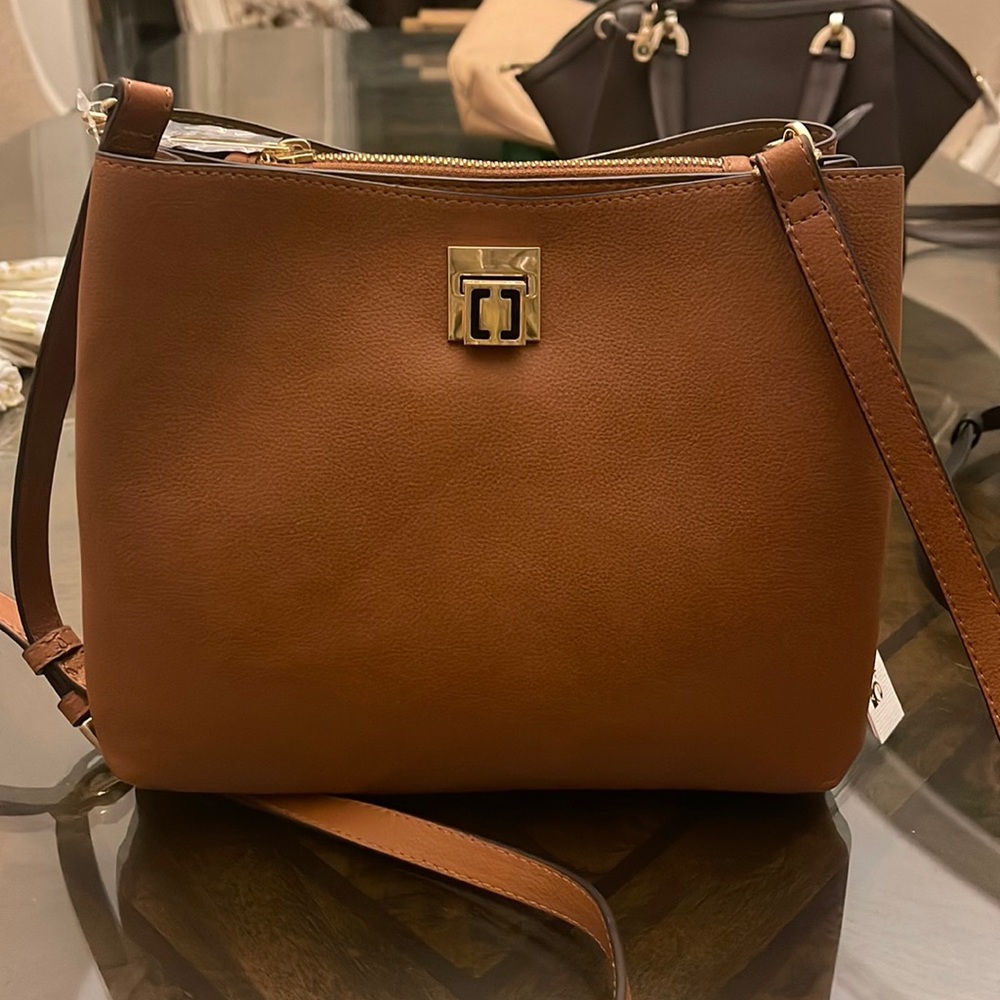 Tan cross body Kate Landry saddle bag.
